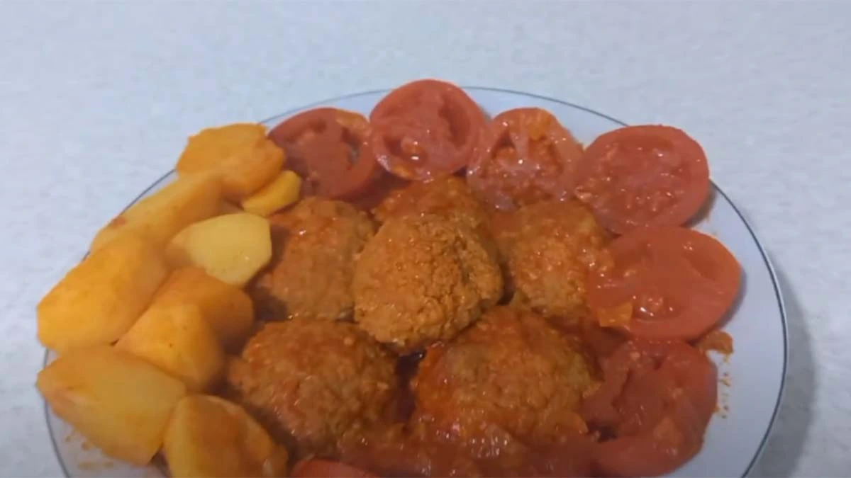 طرز تهیه تتالی (ته تلی)؛ غذای محلی اراک با گوشت و سس